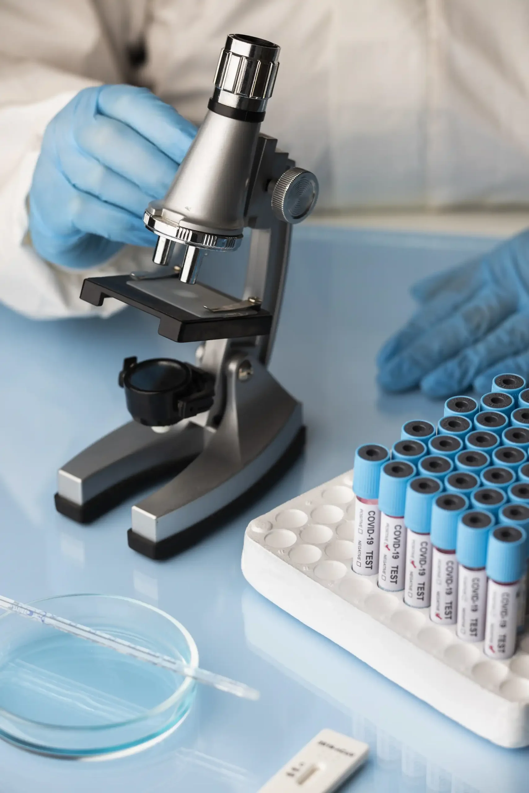 doctor-analyzing-blood-samples-with-microscope